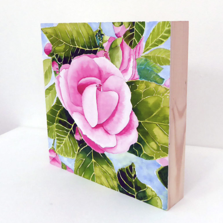 wood panel painted with pink watercolour flower